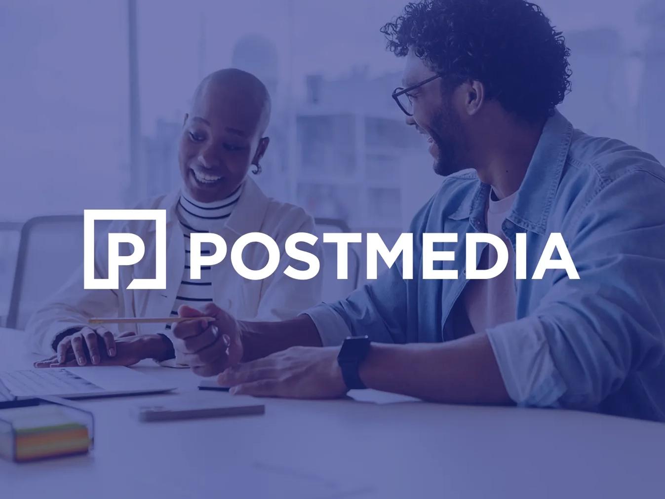 Logo for Postmedia, a Business Wire news distribution partner, overlayed on an image of two people collaborating at a table