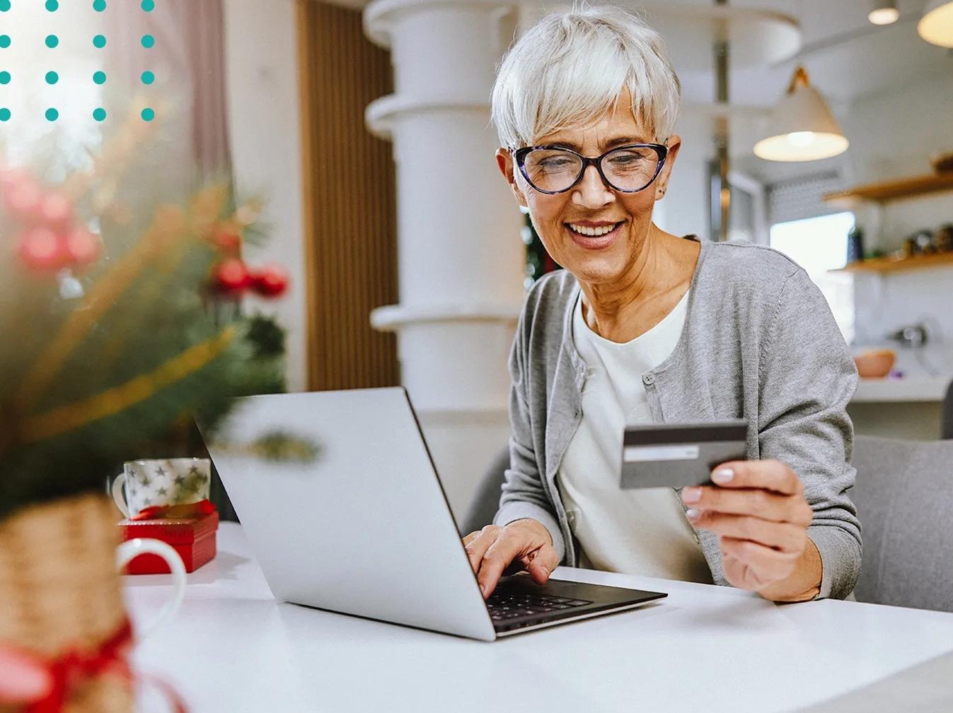 woman entering her credit card information into an online storefront